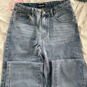 Mom jeans with slits on bottom of legs